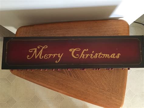 Vintage wooden Advent calendar box with christmas tree and ornaments