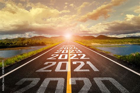 2020-2025 written on highway road in the middle of empty asphalt road ...